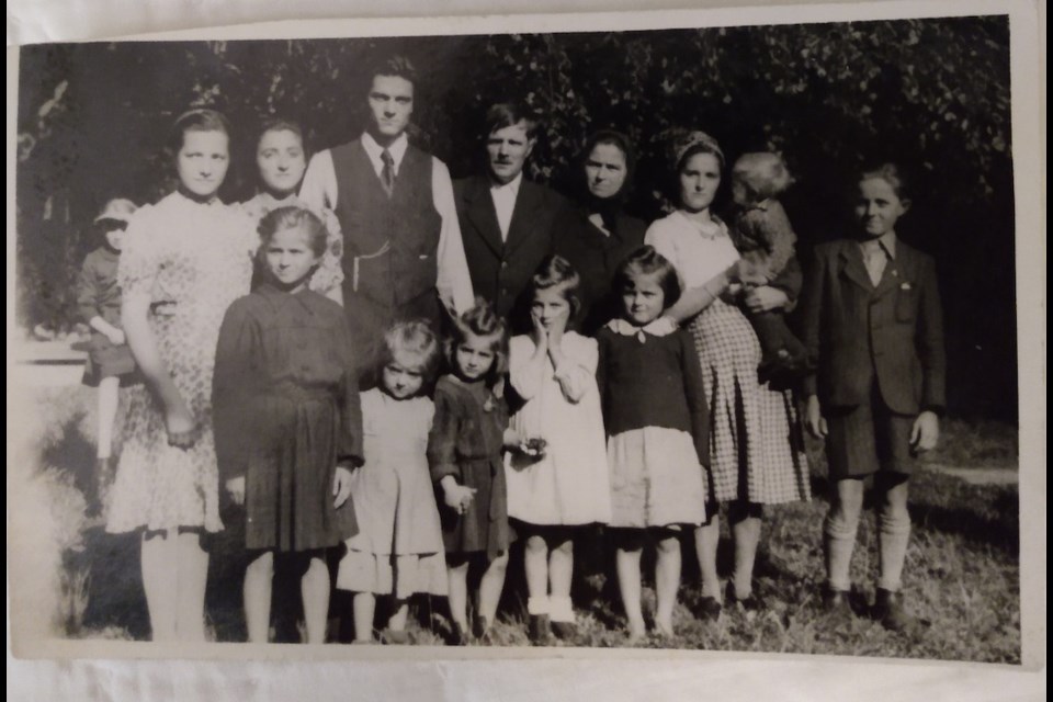 Jennie Tschoban's family in July 1945 in Munster, Germany. Jennie is third from the left in the front row. 