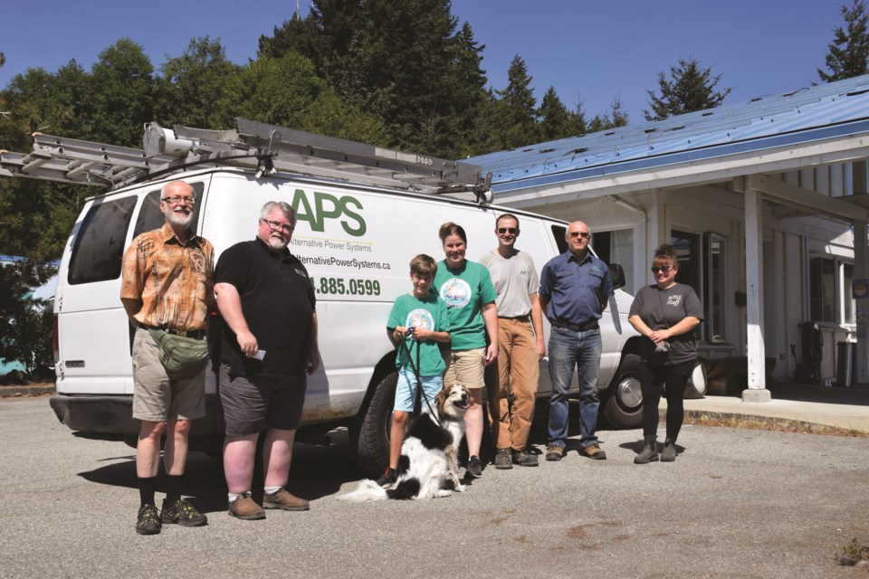 Time to shine (left to right): Sunshine Coast Community Solar Association director Gerry Pageau, SPCA’s Rob Lindskog, Cody and Megan Kelso, Liam Bonser and Dennis Olson of Alternative Power Systems and Olson Electric, and branch manager Marika Donnelly gathered at the Sunshine Coast SPCA on the second day of the solar panel installation to celebrate.