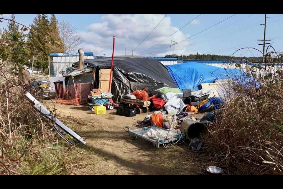 The tent structure is located on privately owned vacant land near Rain City’s Hightide Modular Housing in Sechelt. 