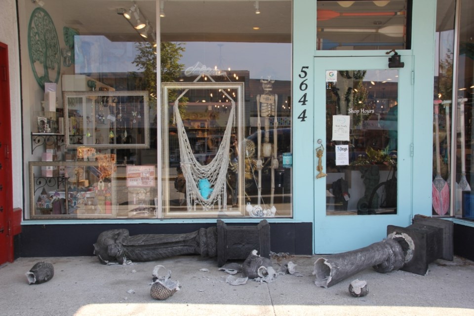 Two Buddha statues were broken outside of the Oracle in Sechelt on June 23.