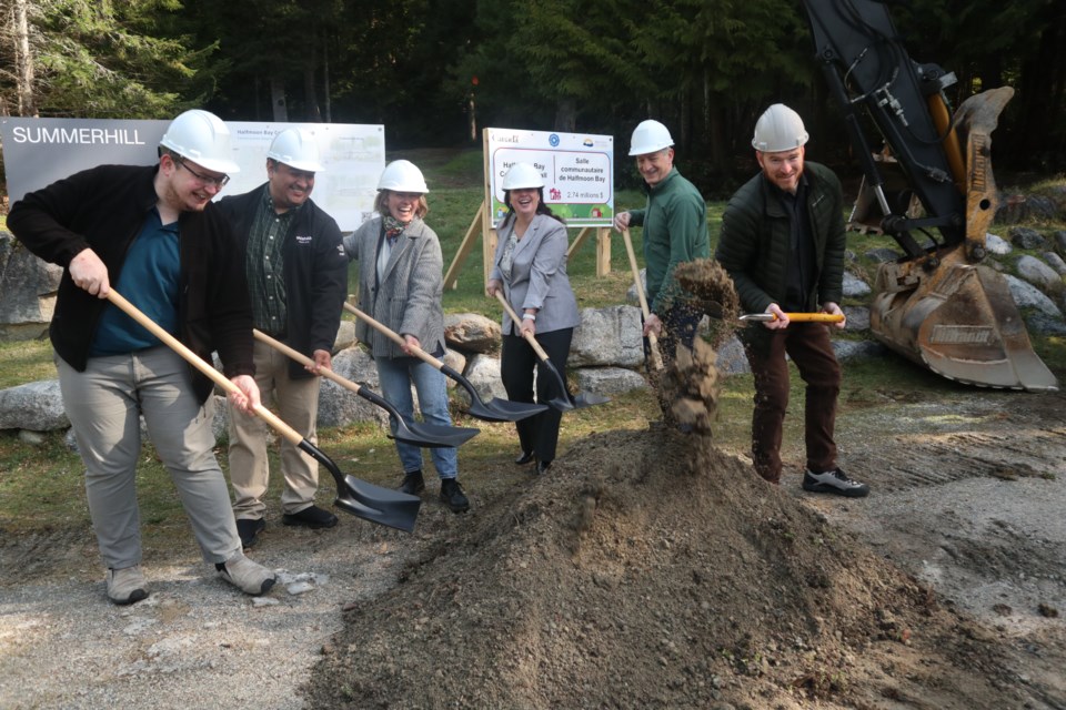 It was smiles and a ceremonial dirt flip at Connor Park April 3 as the Halfmoon Bay community hall project construction got officially under way.                               