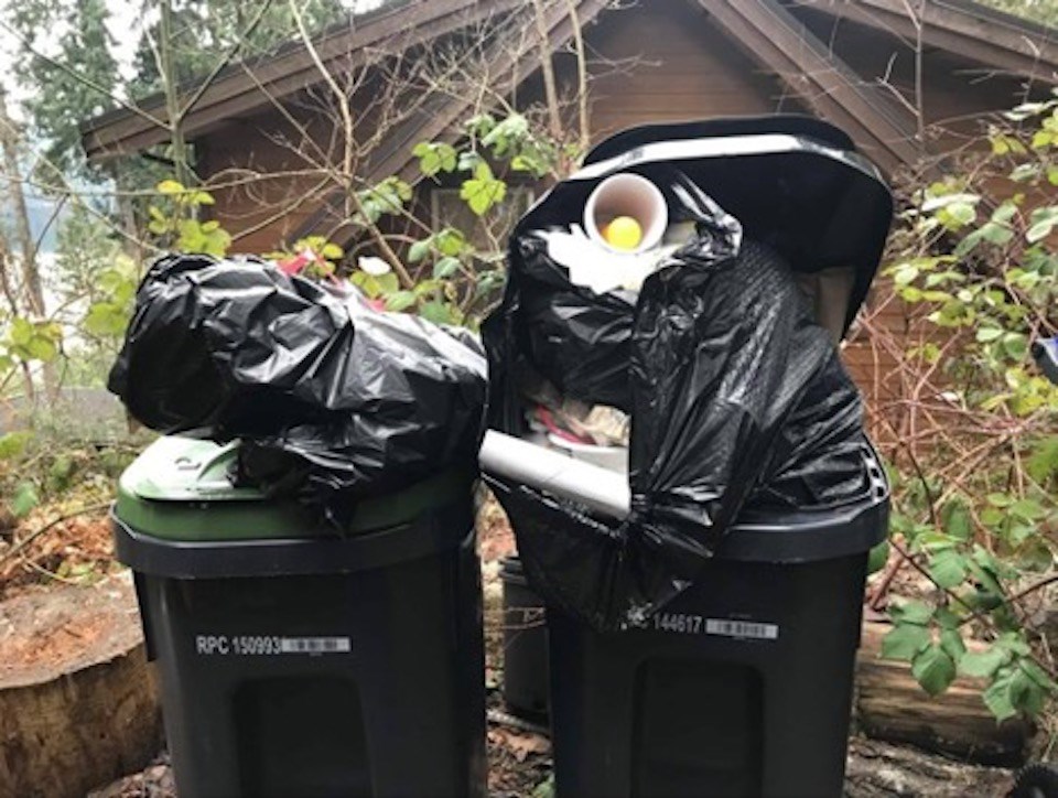 Garbage heaping out of garbage bin