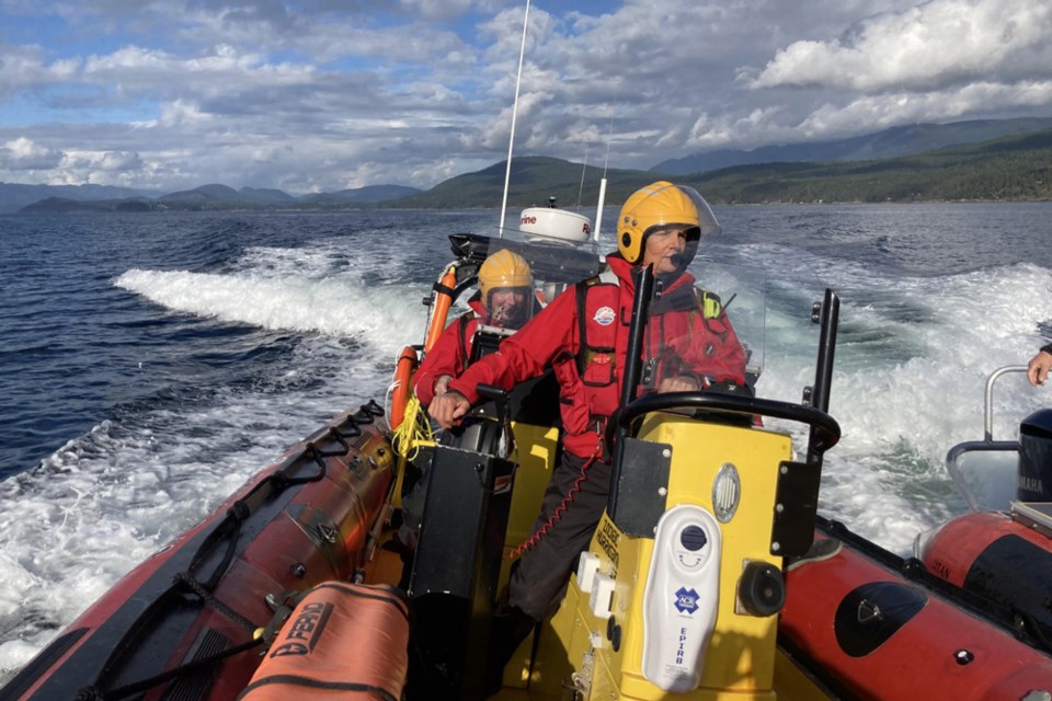 The Royal Canadian Marine Search and Rescue Station 12 team on patrol in Sechelt Inlet. 