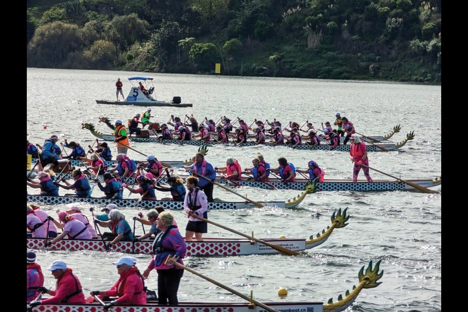 Sunshine Dragons Abreast (second boat from the top) in a tight race in the International Breast Cancer Dragon Boat Festival in New Zealand.