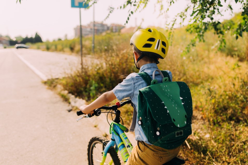 Child cycles to school