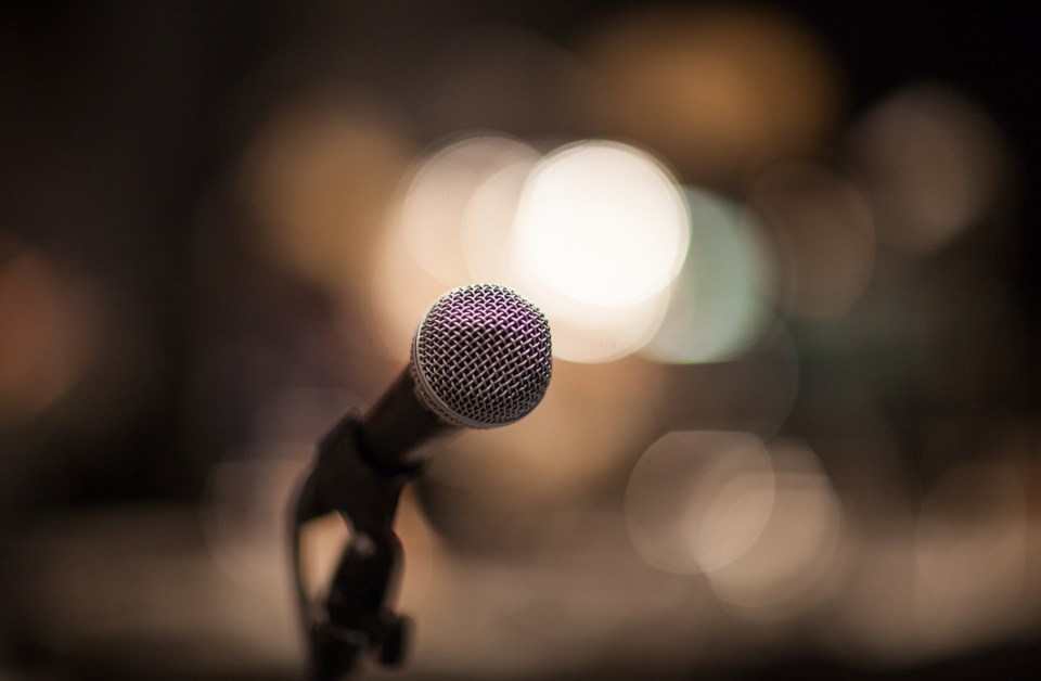 detail of a microphone with some bokeh on background