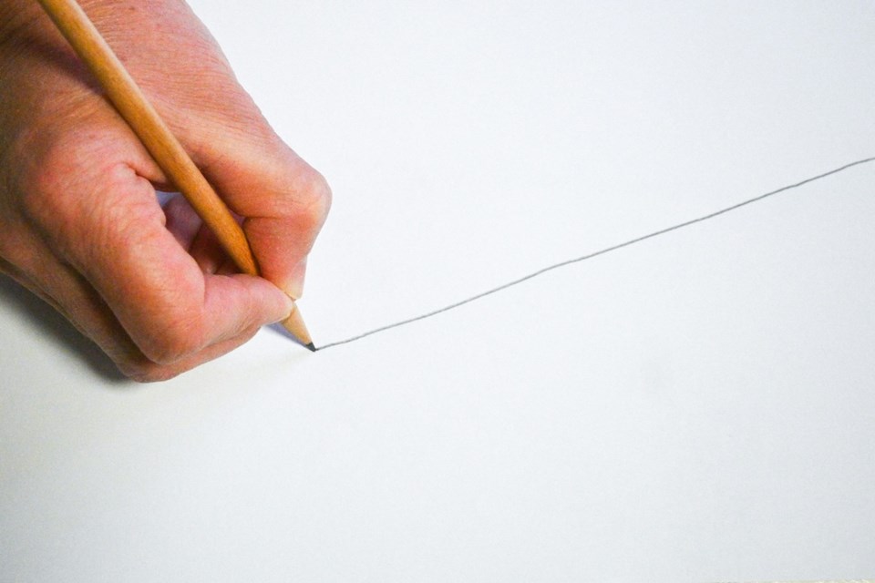 person-drawing-a-line-boundary
