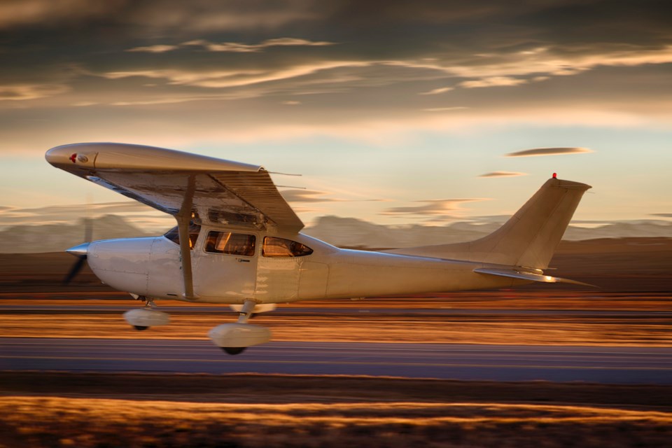 Plane taking off or landing at an airport