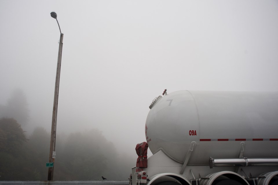 Propane gas tank on truck, waits at the ferry dock.