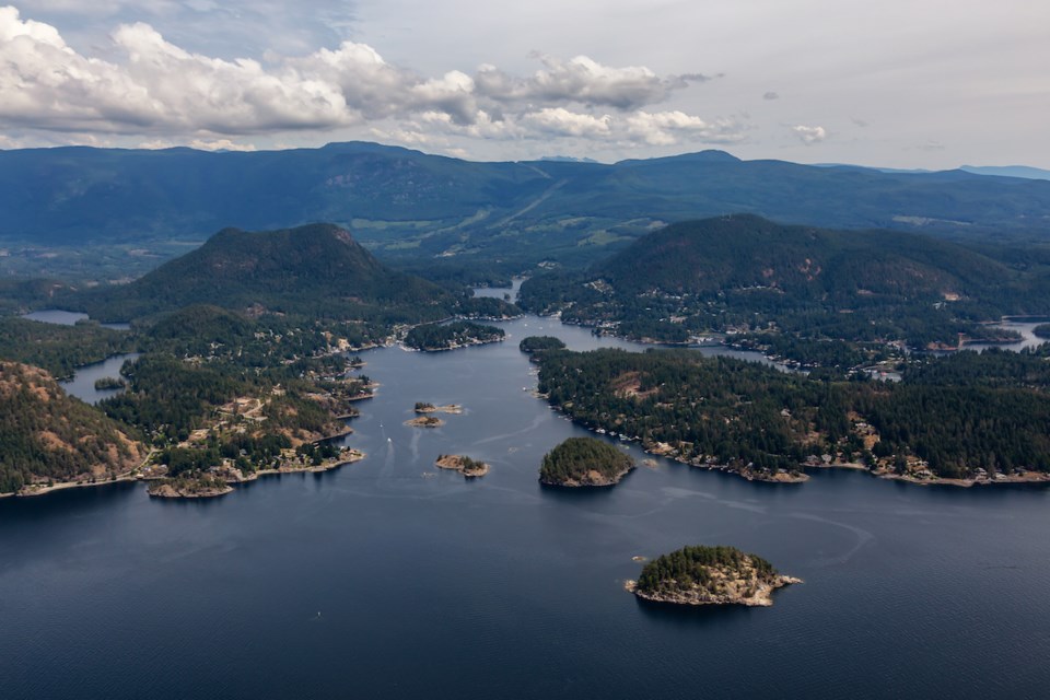 sunshine-coast-british-columbia-canada-aerial-view-of-beaver-island-and-madeira-park-during-a-sunny-and-hazy-summer-morning
