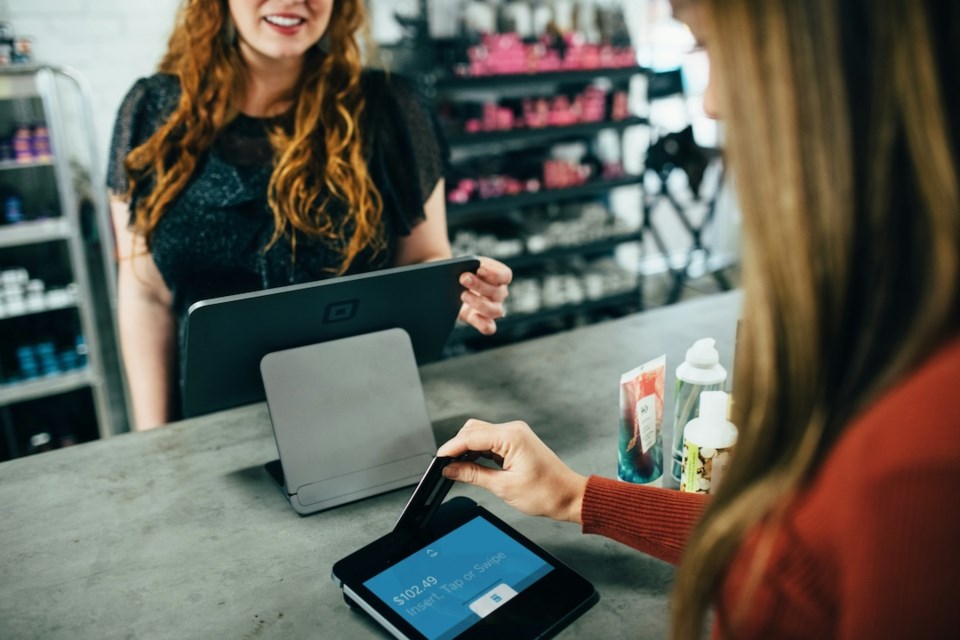 swiping-credit-card-shopping