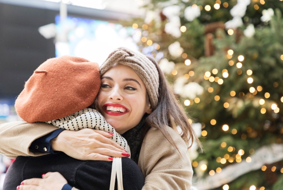 Two women hugging