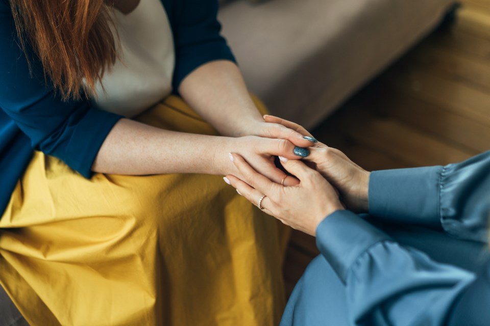 two-women-sitting-in-armchairs-and-talking