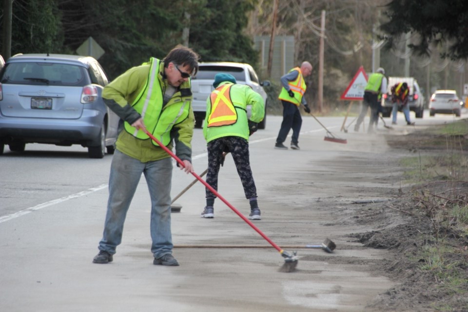 TraC volunteers were spotted sweeping up along Highway 101 between ts'ukw'um (Wilson Creek) and Davis Bay on March 16. 