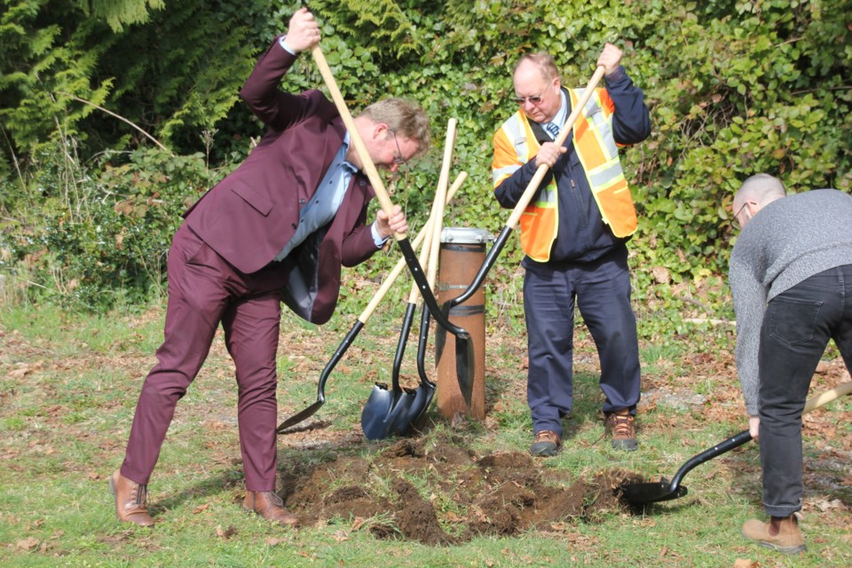 Remko Rosenboom and SCRD staff  dig in preparation of the groundbreaking ceremony at the Church Road well field construction site on March 8. 