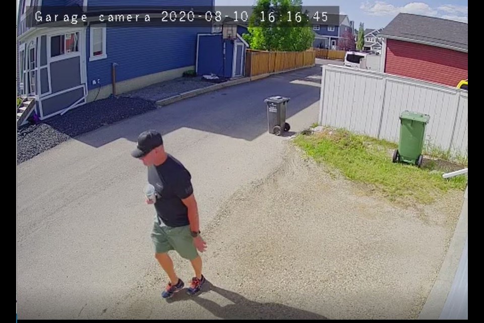 The suspect is described as a middle-aged, Caucasian male, with short-cropped hair on the sides, who rides a distinct black bicycle with a rear splash guard.