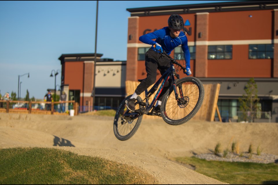 Sam Pickering, 15, takes on Cochrane’s First Bike Park on Wednesday (Aug. 12). (Chelsea Kemp/The Cochrane Eagle)