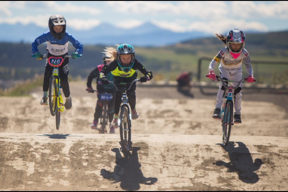 Racers attend the 2020 Nyhaug and Palmer BMX Camp at the Cochrane BMX Association on Saturday (Aug. 22). The two day camp features instructions from Olympic BMX racers Tory Nyhaug and James Palmer. (Chelsea Kemp/The Cochrane Eagle)