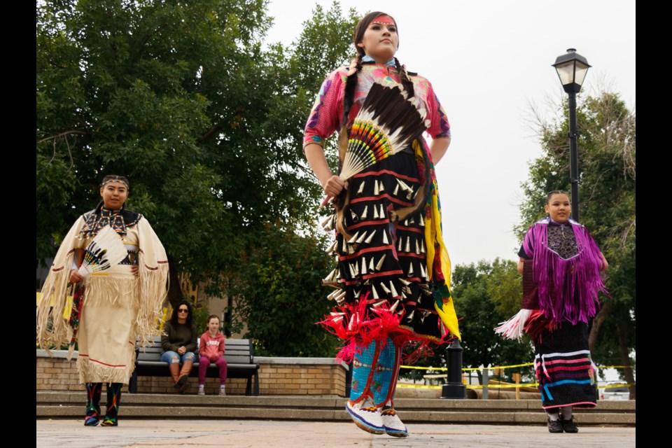 The Stoney Nakoda Mini Thni dancers perform at Centennial Plaza during Cochrane Culture Days on Sunday (Sept. 19). (Chelsea Kemp/The Cochrane Eagle)