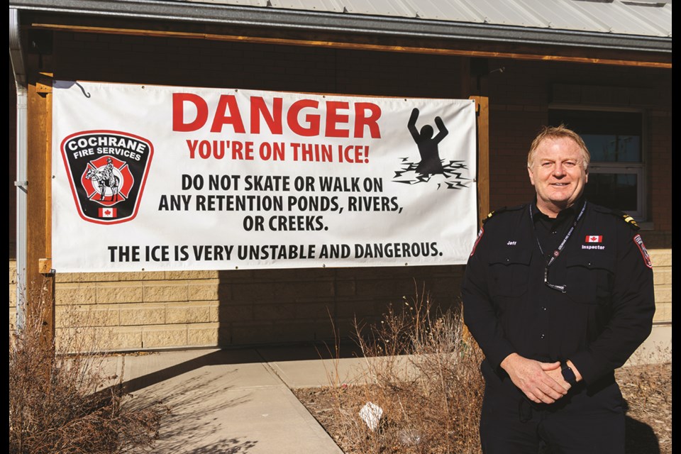 Cochrane Fire Services inspector Jeff Avery poses for a photo at the fire station. (Chelsea Kemp/The Cochrane Eagle)
