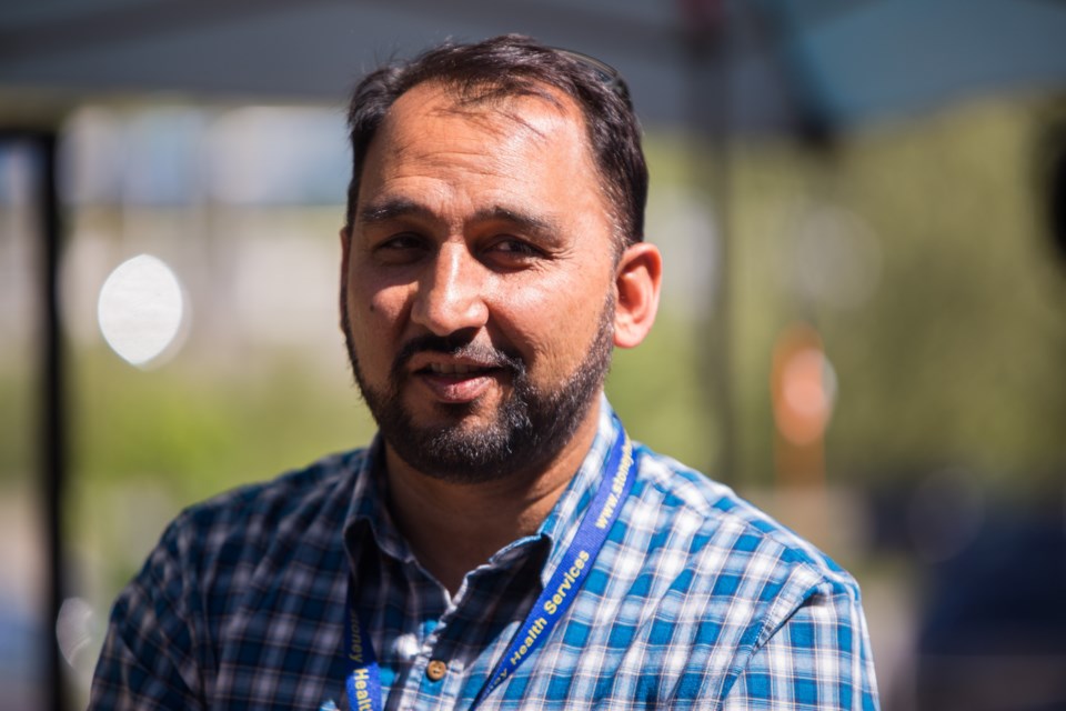 Stoney Health Services executive director Aaron Khan speaks at a community vaccination clinic on Thursday, June 17 in Stoney Nakoda First Nation. (File Photo)