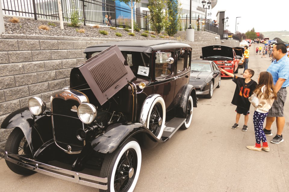 Classic cars, rad rides and wicked wheels gather at Cochrane GM for the 2021 Seniors Lodge Cruise on Saturday (Aug. 7). During the cruise around 50 cars visited Grande Avenue Village, Big Hill Lodge, Bethany Cochrane and Points West Living Inc. (Chelsea Kemp/The Cochrane Eagle)