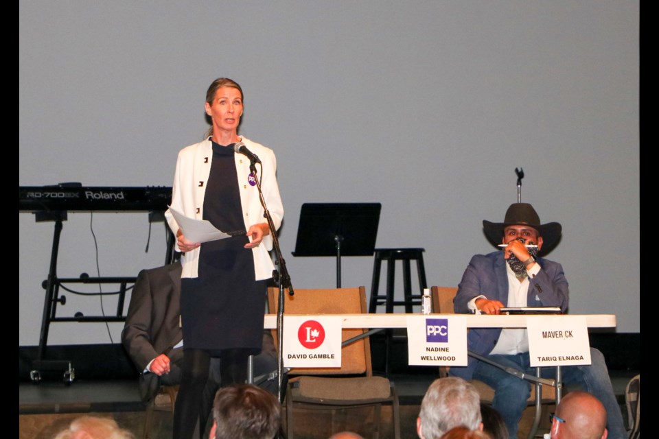 People’s Party of Canada candidate Nadine Wellwood speaks to the crowd at the Banff-Airdrie election forum hosted by the Cochrane and District Chamber of Commerce at RockPoint Church on Tuesday (Sept. 14). (Jessica Lee/The Cochrane Eagle)