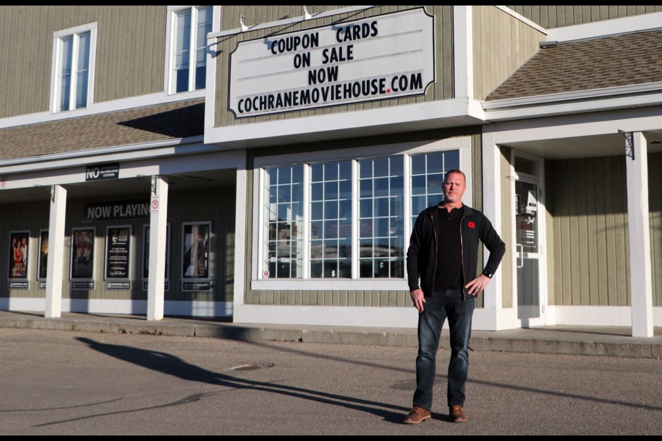 Steven McMichael stands outside the Cochrane Movie House Nov. 7 before an early screening event of "Abducted," a film he produced. (Jessica Lee/The Cochrane Eagle)