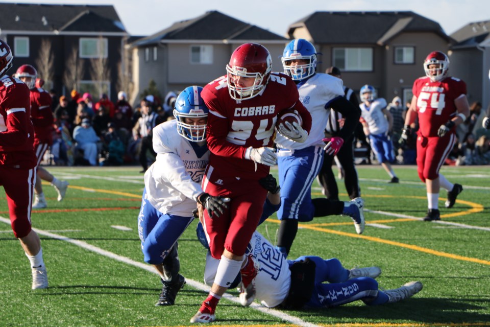 Cobras running back Ethan Price aims to break through the Crescent Heights Vikings defence in the Alberta Schools' Athletic Association Tier III South Final Nov. 20 at Spray Lake Sawmills Legacy Field. (Jessica Lee/The Cochrane Eagle) 