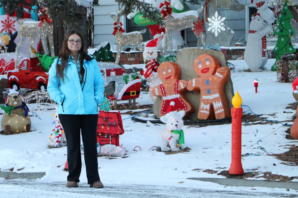 Laurie Moore, who is moving in 2022, said this will be her last year collecting for the food bank after many years of giving back. She plans to sell her extensive collection of holiday decor once the season ends. (Jessica Lee/The Cochrane Eagle)