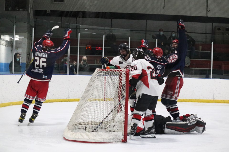 The Gens celebrate a goal over the Airdrie Thunder at the Cochrane Arena Jan. 22. (Jessica Lee/The Cochrane Eagle)