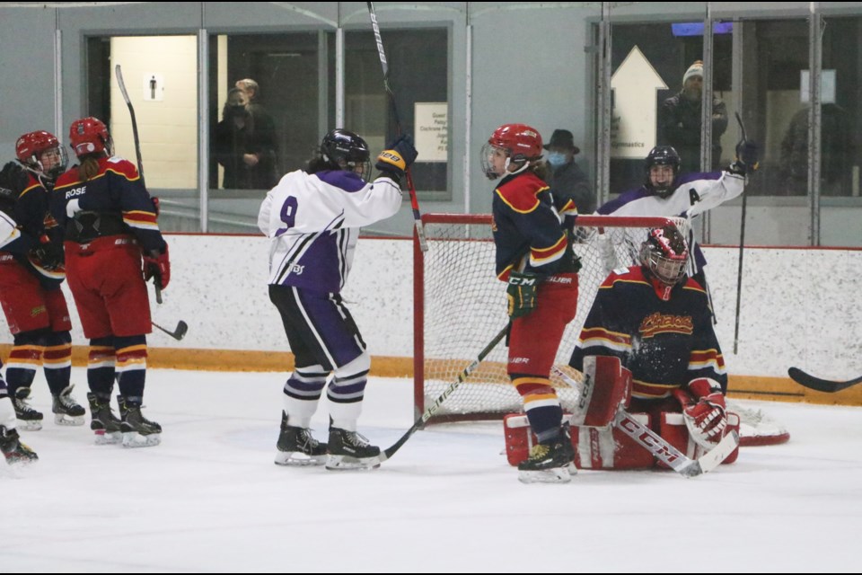 The Eagles celebrate a goal after getting a shot past Chaos goalie Cassidy Brown in Game 1 of the AJFHL south final at Spray Lake Sawmills Family Sports Centre Feb. 25. (Jessica Lee/The Cochrane Eagle)