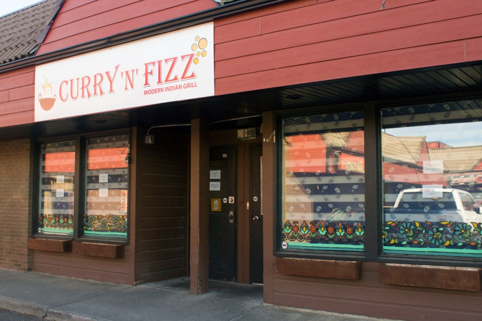 Curry 'N' Fizz, a local Indian restaurant located on 1st St., reopens its doors to the public tomorrow after facing several tribulations through the year.