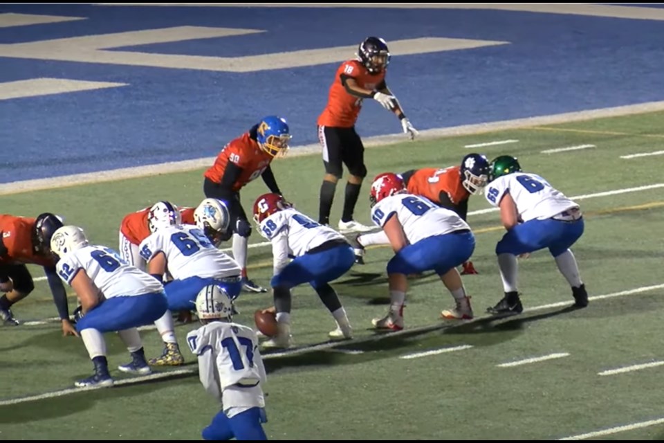 Jacob Patterson snaps the ball for Team Alberta U18 in a game against Team B.C. Dec. 20. (Screenshot)