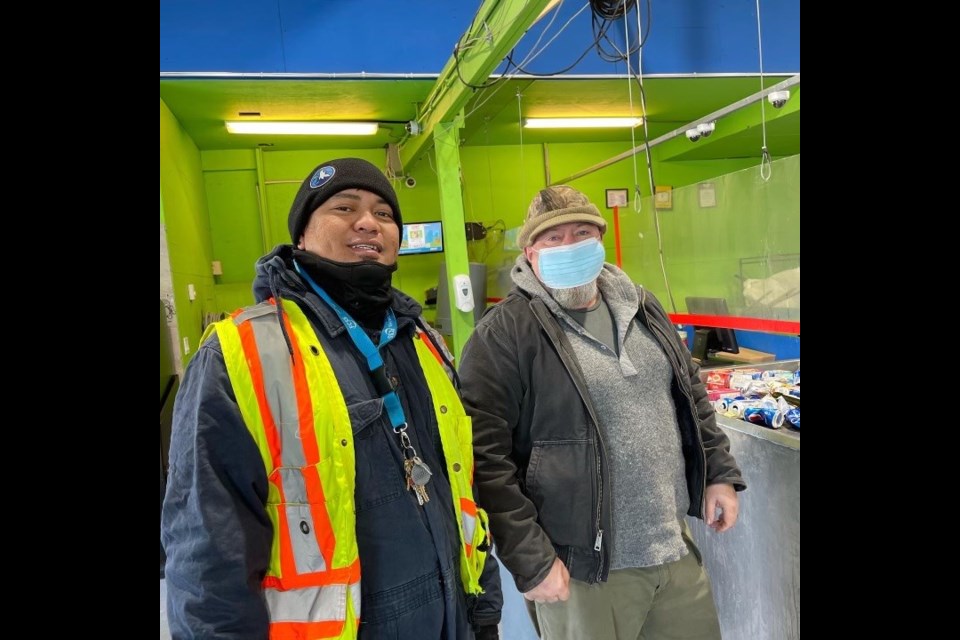 Kenji Paul Ville, left, and Alf Leslie volunteer to collect and bring recyclables from the child care bottle drive to the Cochrane Bottle Depot. (Photo Supplied/Paul Singh)