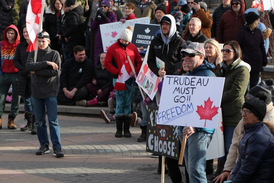 Hundreds attend a rally at Cochrane's Centennial Plaza calling for an end to all COVID-19 mandates Jan. 30. (Jessica Lee/The Cochrane Eagle)