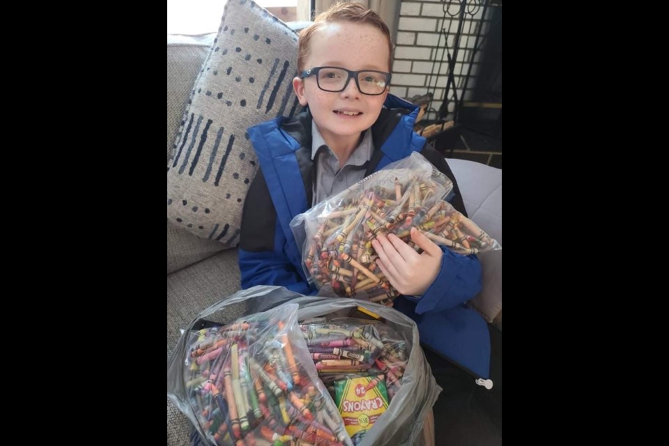 Jacob Simister, a local Grade 4 student, is repurposing used crayons to keep them from ending up in the ocean. (Photo Submitted)