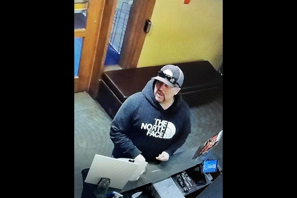A male suspect punched an employee of Mr. Mikes in the face Feb. 12 when asked to wear a mask before entering the restaurant. Cochrane RCMP are now looking to identify the man responsible for the assault. (RCMP)