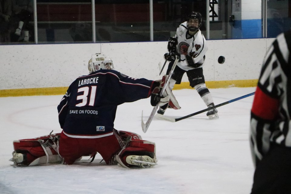 Gens goalie Davyn LaRocke deflects a shot on net in Game 1 of the HJHL north final against the Red Deer Vipers March 3 at the Cochrane Arena. (Jessica Lee/The Cochrane Eagle)