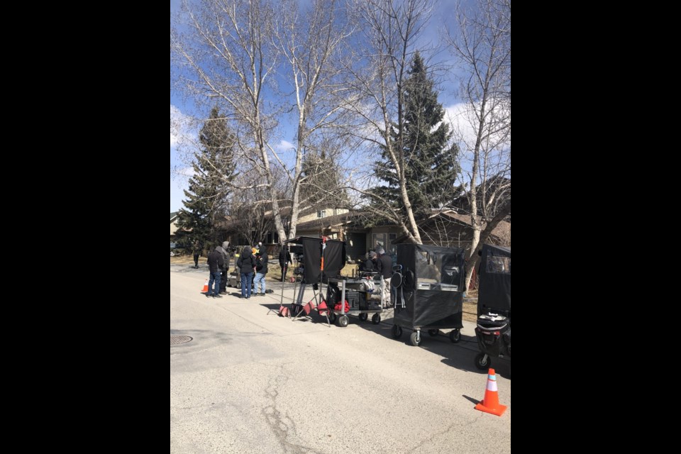 Filming Netflix series My Life With the Walter Boys on Glenhill Drive Monday. (Howard May/The Cochrane Eagle)