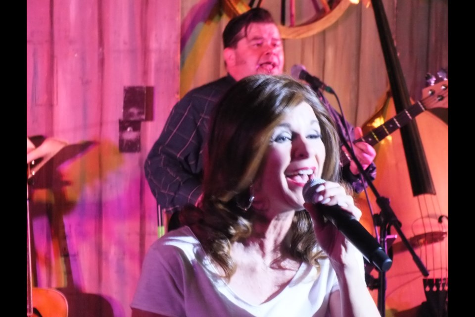 Andrea Rochelle performs as Shania Twain in the Louisiana Hayride tribute concert in Cochrane Friday, April 22.