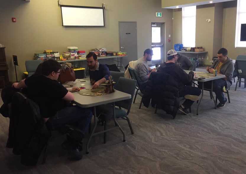 Members of the Cochrane Board Game Group meet at the Cochrane Alliance Church for one of the group’s monthly game nights. (Photo Submitted)