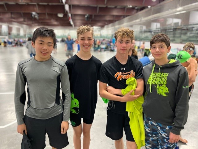 Tony Koo, left, Caebri Smith, Eli Fitzsimmons and Oliver Johnson won first-place for the Cochrane Piranhas Summer Swim Club in the boys 13-14 200-metre medley relay race at a swim meet in Didsbury June 4. (Photo Submitted/Kate Johnson)