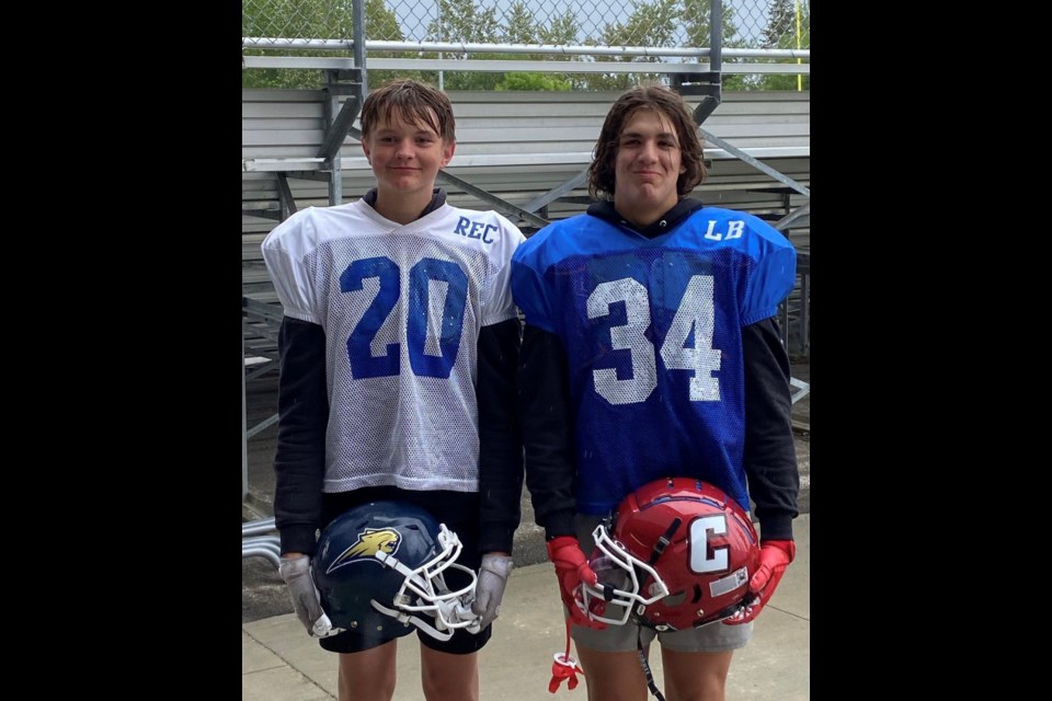 Friends and former Cochrane Lions Minor Football players James Drake, left, and Bennett Fauth, right, will play one more game together as teammates at the Football Canada U16 Western Challenge July 3 to 6 in Langley, B.C. In the fall, Drake will play for the Bow Valley High Bobcats football team while Fauth will join the Cochrane High Cobras. (Photo Submitted)