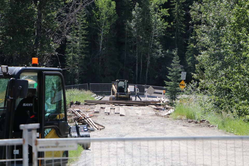 Construction is underway on the 4 Avenue North bridge replacement project. The Town of Cochrane reported on its Facebook July 21 that bear tracks were recently spotted underneath the bridge. (Jessica Lee/Cochrane Eagle)