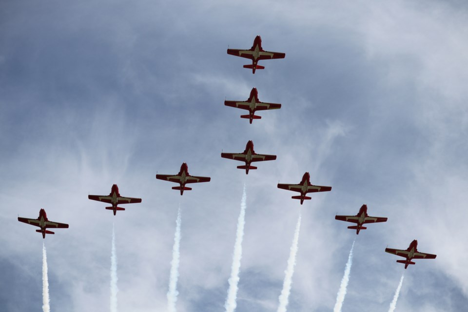 The Canadian Forces (CF) Snowbirds 431 Air Demonstration Squadron makes their entrance to the Wings Over Springbank Airshow performing the Canada Goose formation on July 24. (Jessica Lee/Cochrane Eagle)