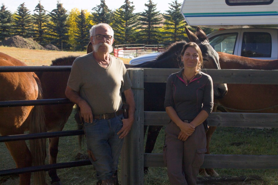 Emile Brager (right) and Marie Delmas (left). Brager is the founder of the international riders guild 'Cavalier au long cours,' Him and Delmas are travelling from Hummingbird Creek to Lethbridge by Mule