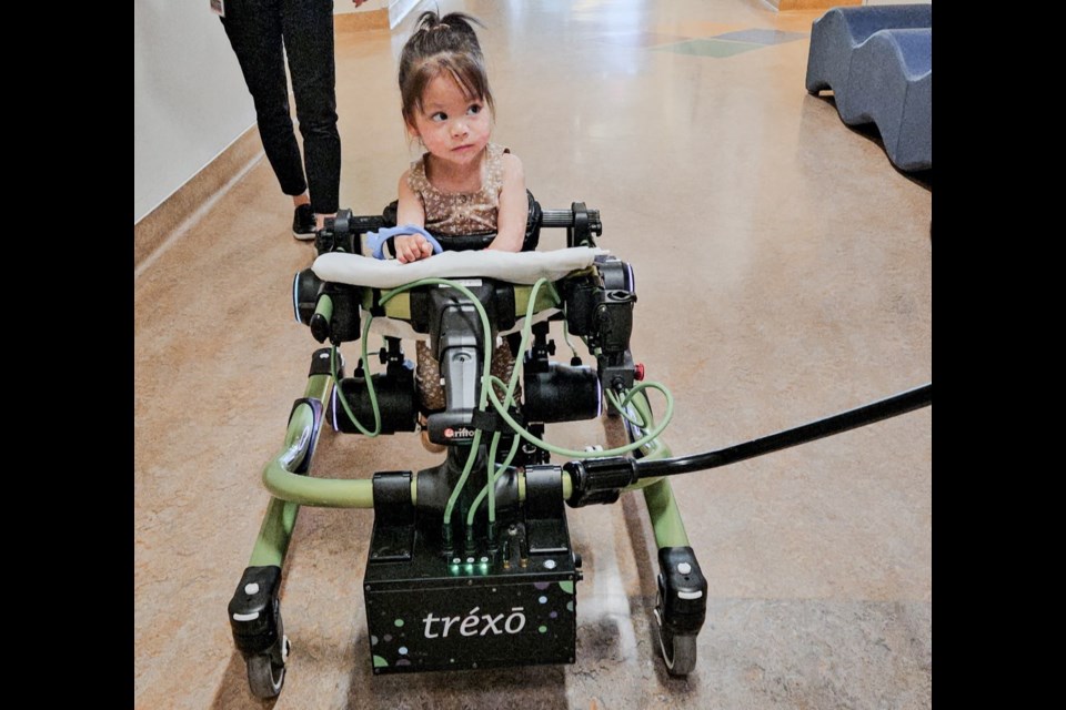 The mother of three-year-old Brielle Thomson is raising money to help pay for a robotic device that will help her learn to walk.