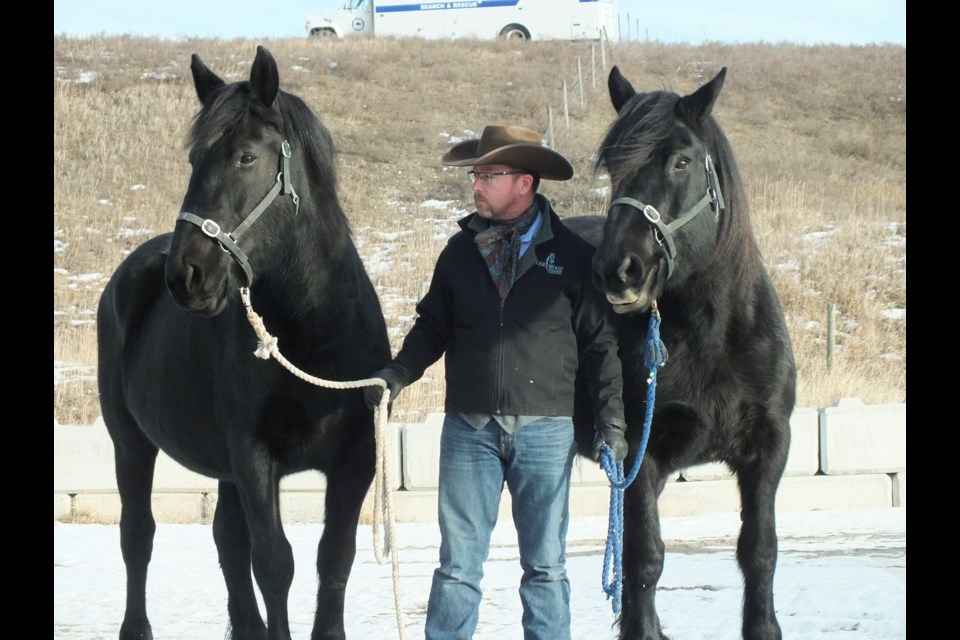 Ryan Fleetwood with Pearl and Paris in Cochrane.