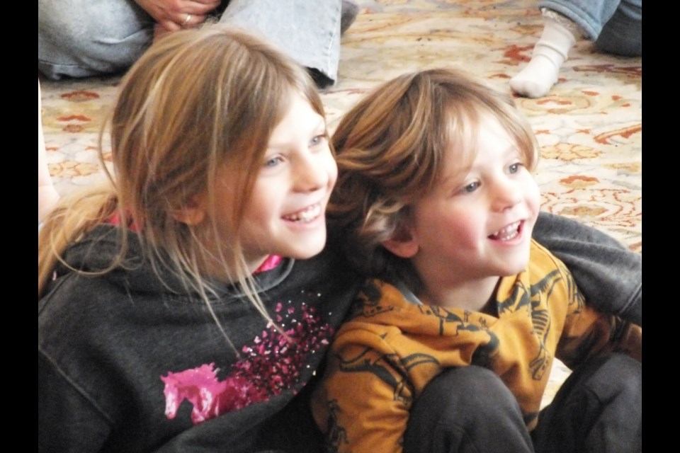 Seven-year-old Ayla Lippens protected 3-year-old little brother Colton from the ferocious tiger puppet.